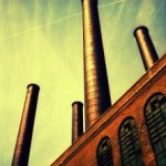 Brick Smokestacks Green Sky